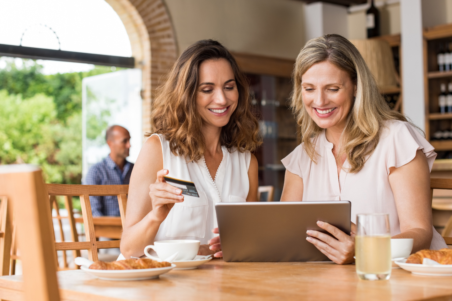 Meridian Bank members reviewing their account together